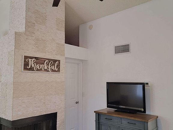 Fireplace, and ceramic tile throughout the home.