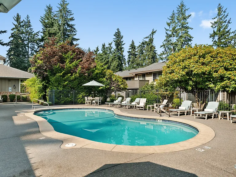 Relax by the pool with plenty of seating and shaded areas.