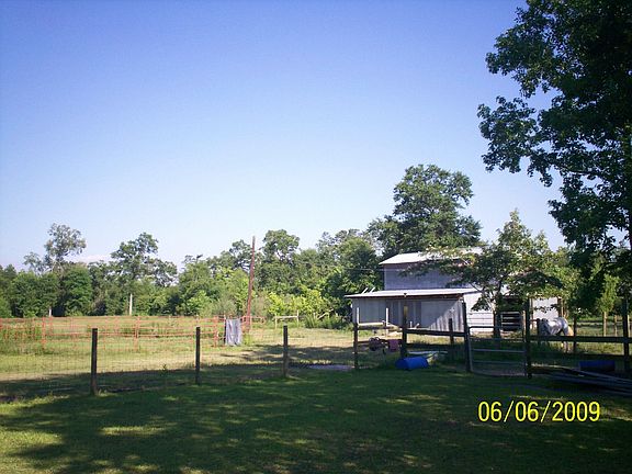 Back pature & 5 stall horse barn with hay loft