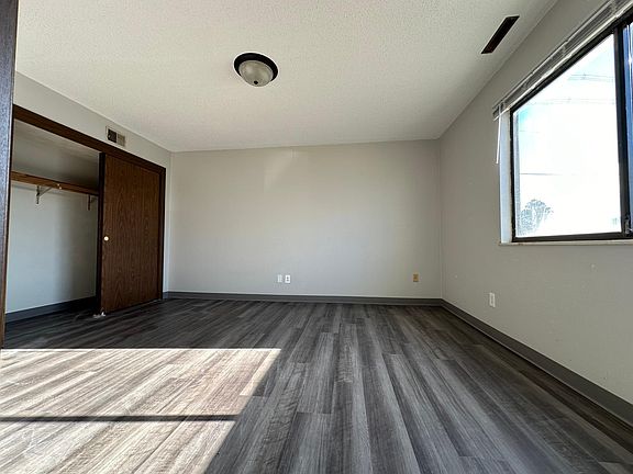 Bedroom large enough for a king sized bed and dressers. Nice sized closet.