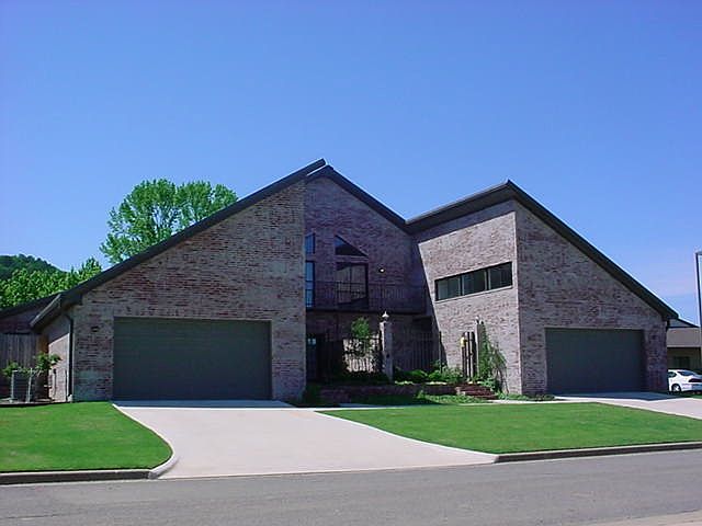 Outside, duplex for rent is on right side. Gated entrance w/