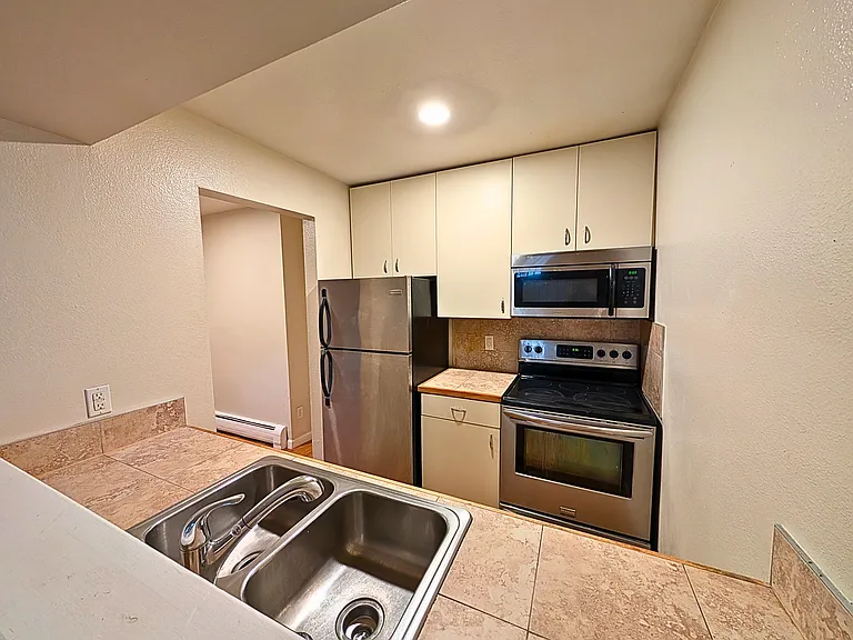 1940 W 32nd Ave #201 — Photo 4