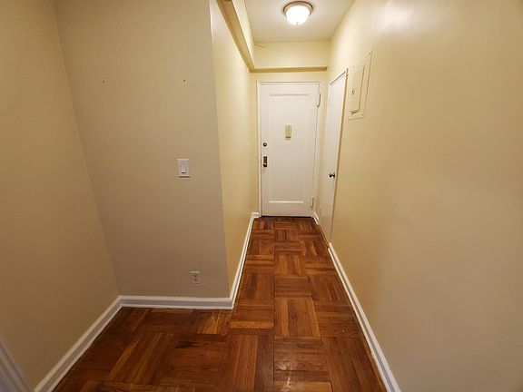 Large entry foyer with coat closet.