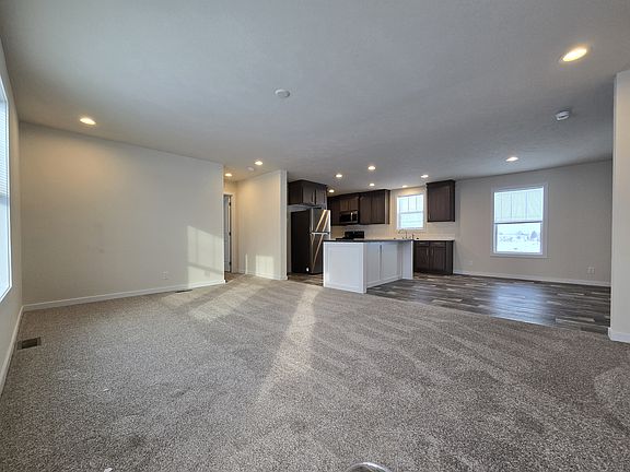 3rd image of 7204 E Grand River Ave Lot 406