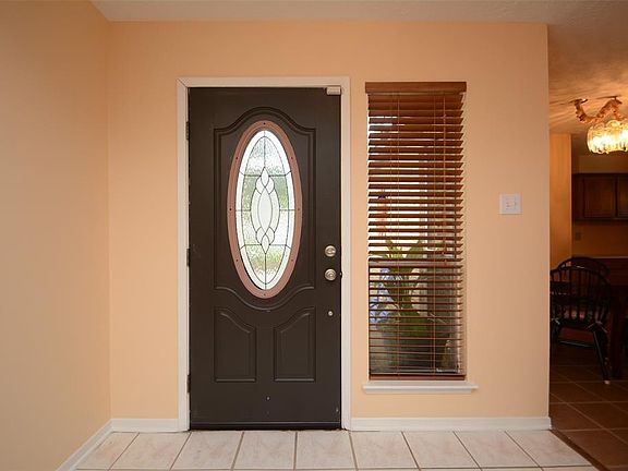 Entry, freshly painted and a recently installed door.