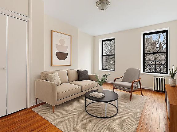 2nd image of 107 E 2nd St APT 14