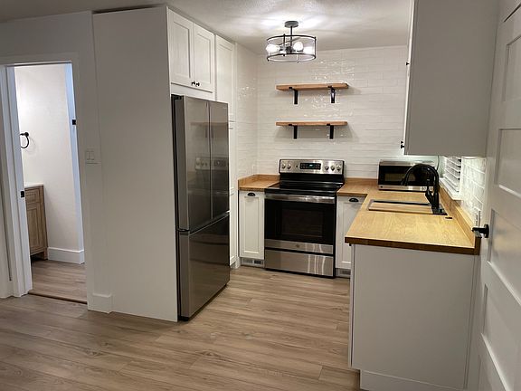 Kitchen and bathroom.