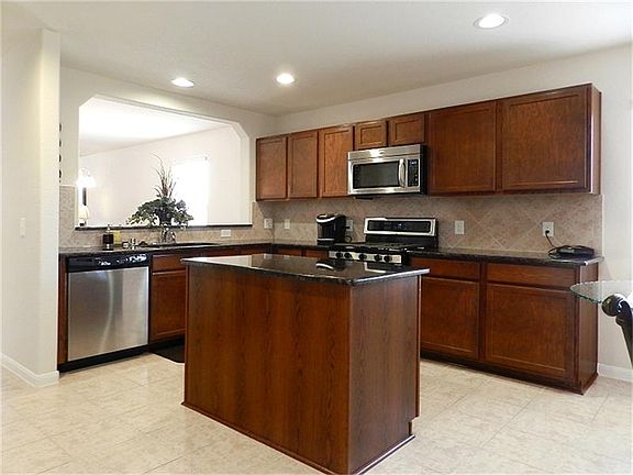 Wow! Granite counters and stainless gas appliances!