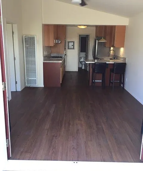 Living/dining to kitchen and bath