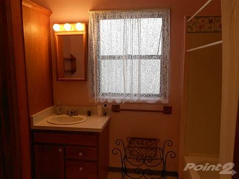 Large full bath in hall.