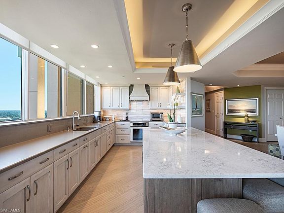 5th image of 7117 Pelican Bay Blvd APT 1609