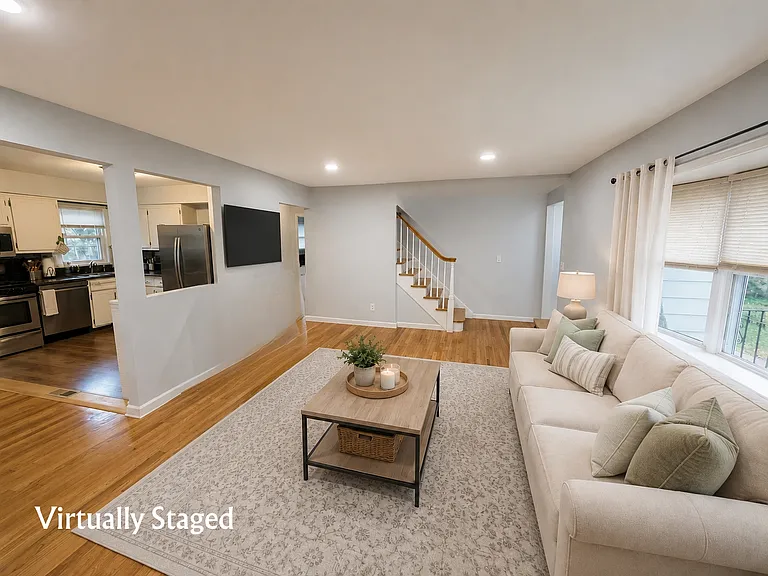 Bright and spacious open-concept Living Room (Virtually Staged & Digitally Enhanced)