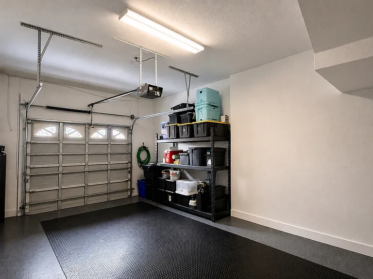 Clean Garage with storage rack included - 1720 RETREAT VIEW CIR.
