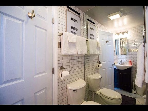 Full Bathroom with bath tub.