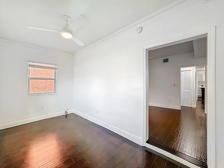 den with doorway into living room