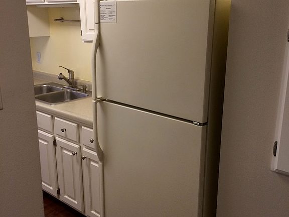 View of the kitchen from the far hallway