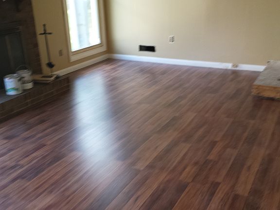 Laminate flooring going in.
