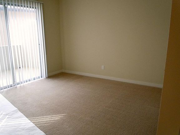 bedroom with private patio
