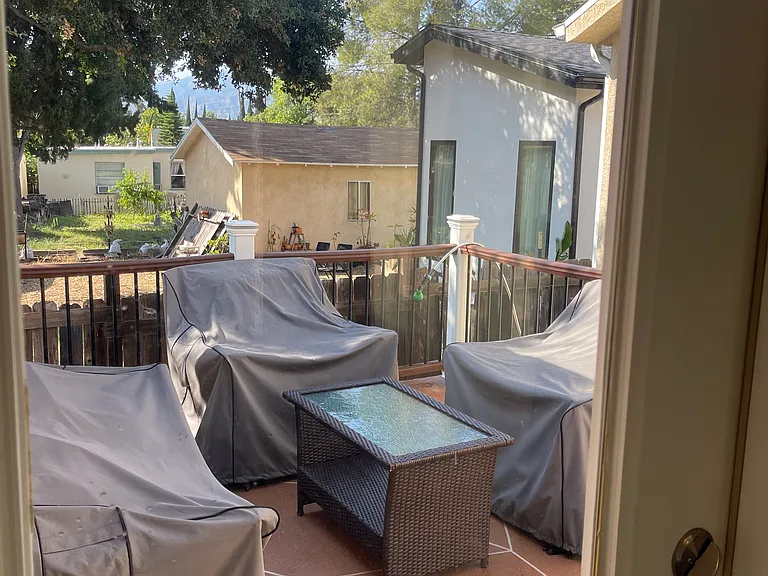 Patio viewed from the interior of the unit. The furniture is not included