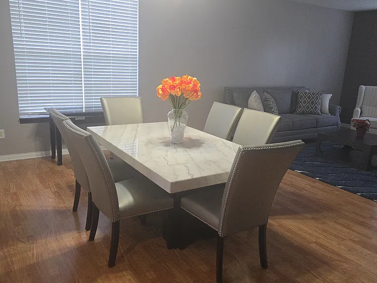 Dining room: Includes a marble dining table with (6) Chairs