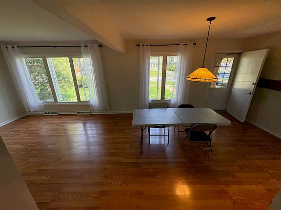 Front door. Same dining room and living rooms, 6 foot table to show scale.