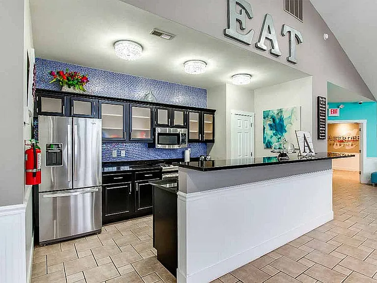 The clubhouse's full kitchen and coffee bar are available for residents to use.