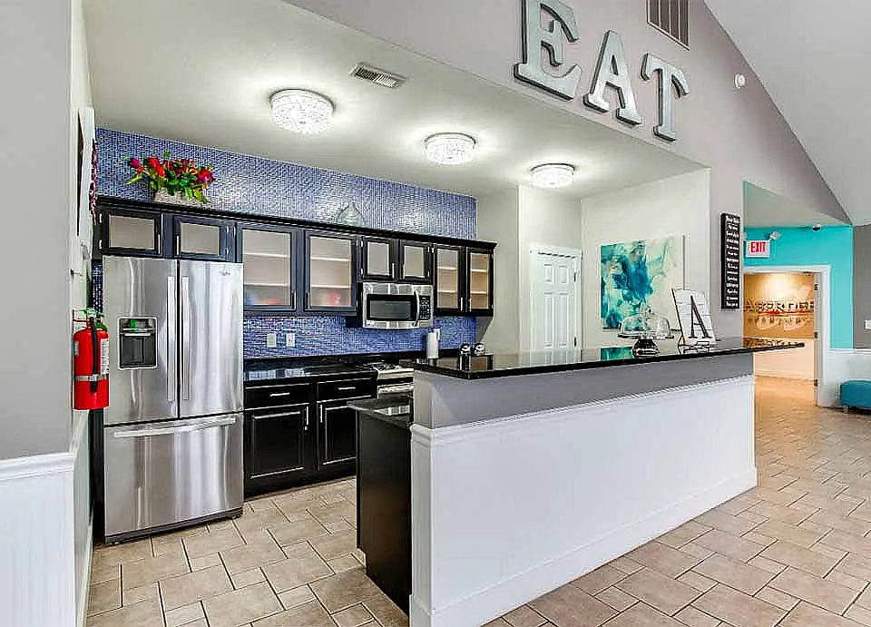 The clubhouse's full kitchen and coffee bar are available for residents to use.