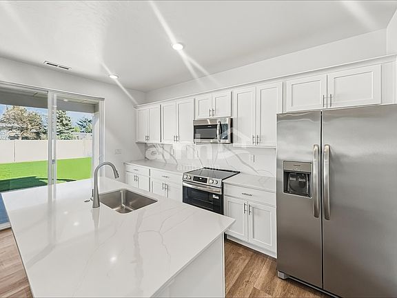 3rd image of 10041 W Malad St