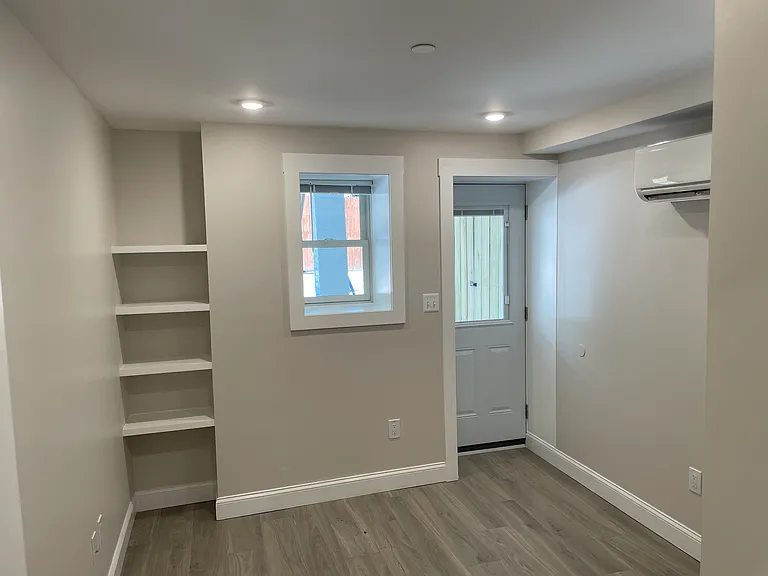 Main bedroom with built-in storage.