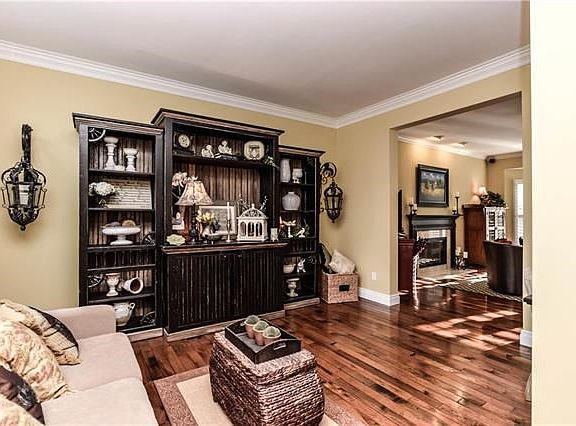 Gracious living room opens to the family room