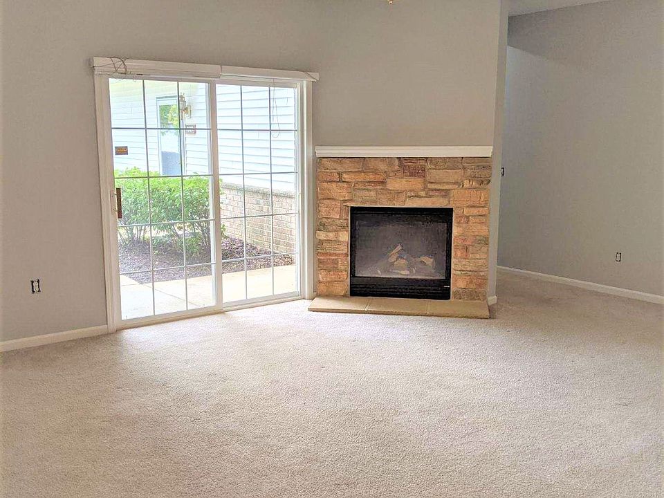 Great Roomwith patio doors and gas fireplace.