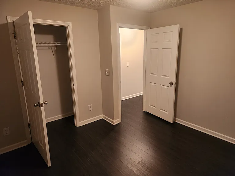 First room with closet at the end of the hallway