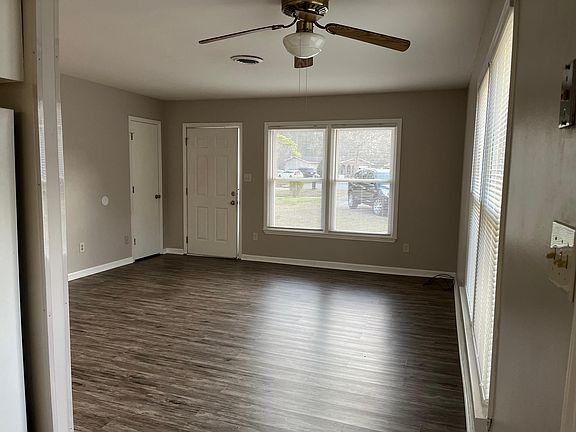Living Room 14'7" x14'8" looking from Kitchen to front door.