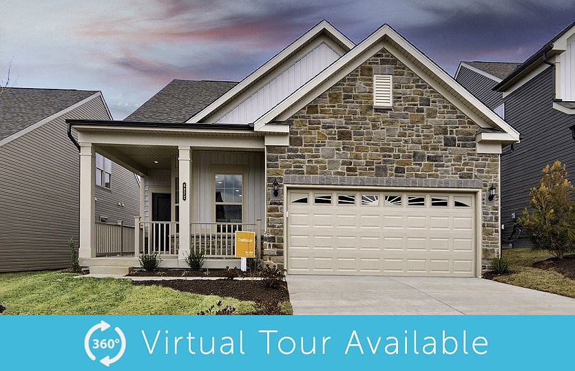 Exterior view of the Trailblazer, a one-story home with a 2-car garage - Elevation 6 at Carter s Mil