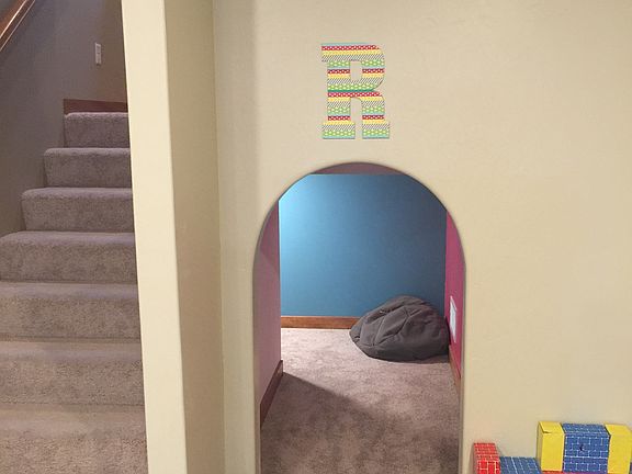 Kid's play area under stairs