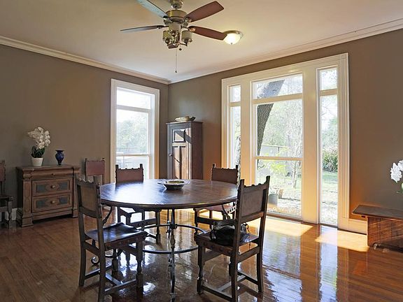 Spacious dining room over looks expansive back yard. Windows replaced with double hung low e windows.