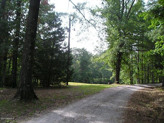 Long, private driveway.