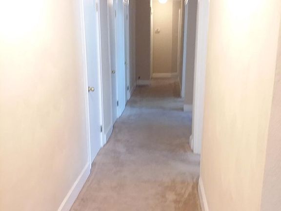 Lots of storage with 3 closets on left side of hallway