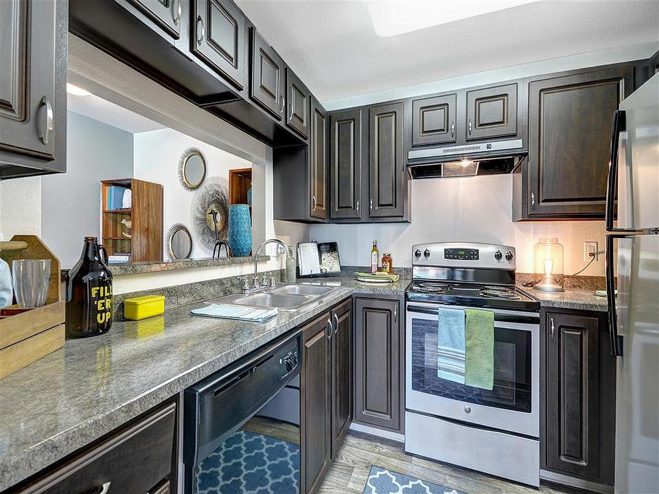 Newly renovated kitchens with silver appliances as well as new counters and cabinets