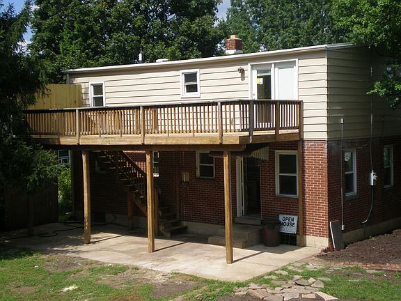 Large deck accessed from the master bedroom overlooks private back yard