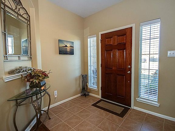 Spacious Foyer with lots of Natural Lighting.