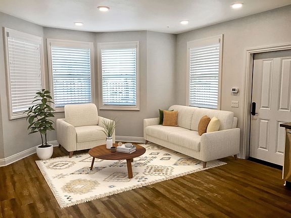 Great room living space with luxury vinyl plank floors (furniture not provided)