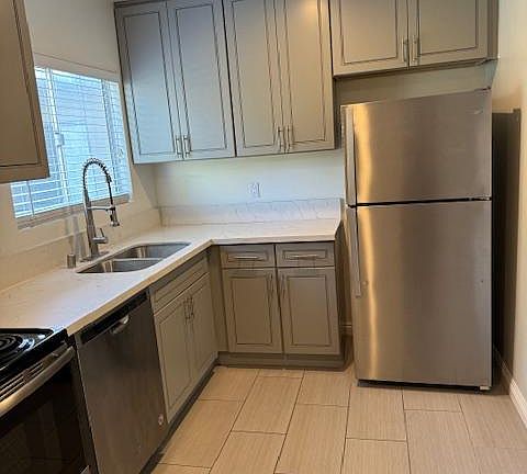 Full-size Stainless Refrigerator, Range, Dishwasher and Built-in Microwave