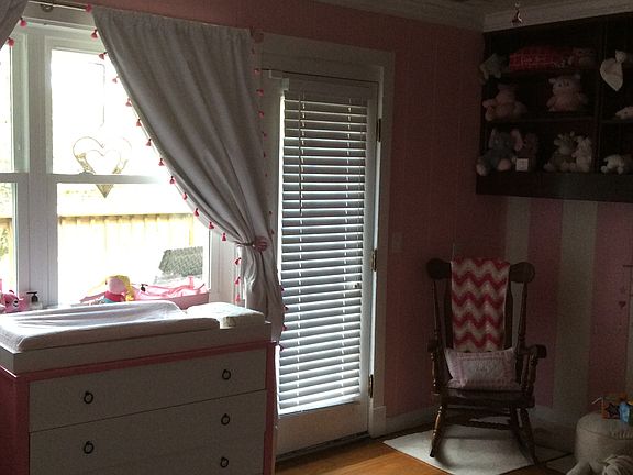 Bedroom with door to patio