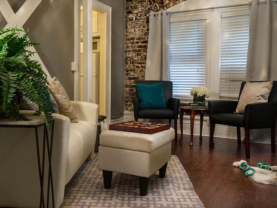 Brookmore Suite with Exposed Brick Wall