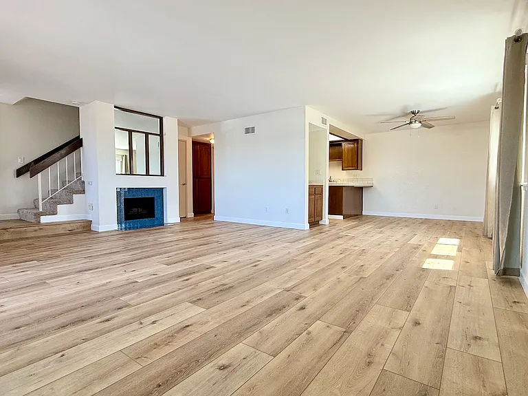New luxury vinyl plank flooring on lower level.