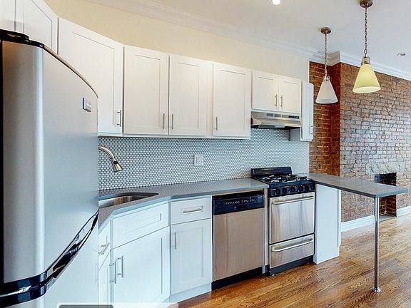 2nd image of 545 E 12th St APT 2B