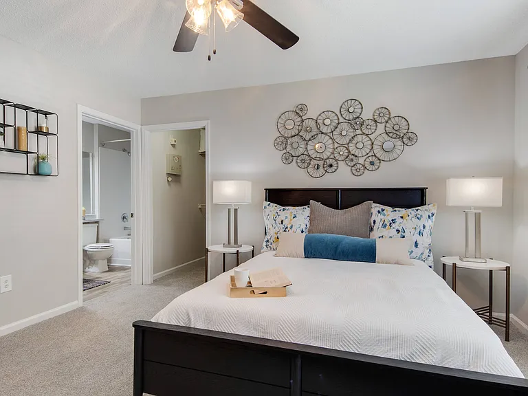 Bedroom with Ensuite Bathroom and Walk-In Closet