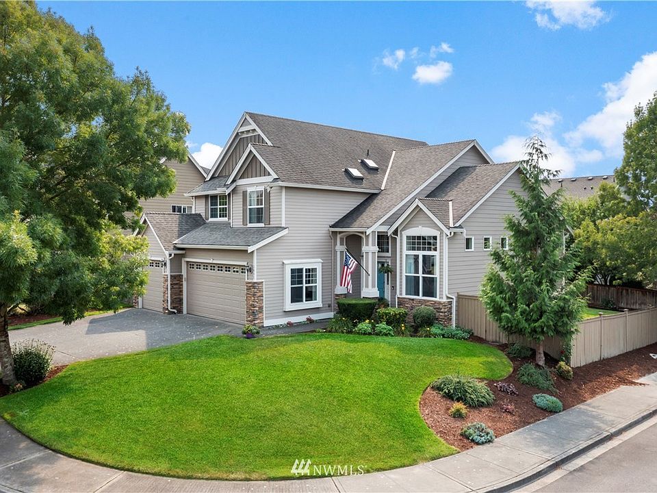 Welcome to this spacious & beautifully appointed home nestled on a roomy corner lot