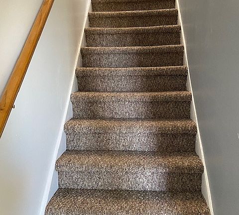 Stairs to upper bedroom